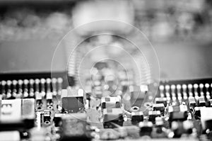 Chips on the board. Close-up. Black-and-white.Technological progress concept