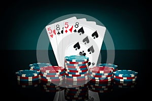 Chips and cards in casino. Playing cards in poker game with two pairs combination. Successful and win