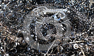 Chips and curls of ferrous metal into landfill for recycling 3 photo
