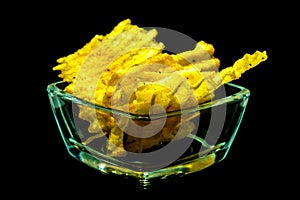 chips in glass form on a black background, isolate