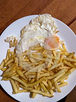 Chips plate with a fried egg