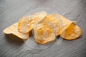 Chips potatoes on chalkboard background