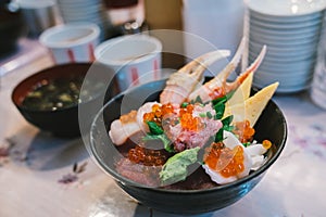 Chirashi Sushi Don or sashimi donburi, Japanese food rice bowl topped with mixed raw seafood