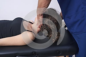 Chiropractic getting mobilization cervical spine of a woman. Manual therapy. Neurological physical examination. Osteopathy,