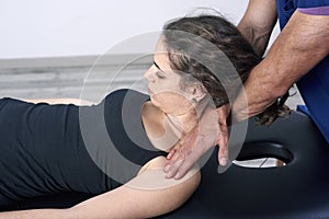 Chiropractic getting mobilization cervical spine of a woman. Manual therapy. Neurological physical examination. Osteopathy,