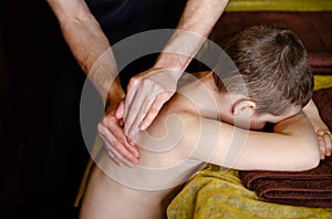 Chiropractic, osteopathy, dorsal manipulation. A medical massage of the back