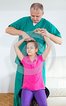 Chiropractor doing adjustment on female patient