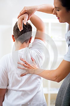 Chiropractor doing adjustment on patient