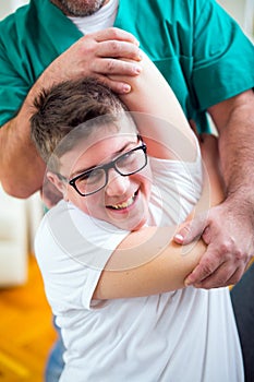 Chiropractor doing adjustment on patient