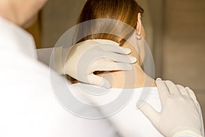 Chiropractor doing adjustment women neck