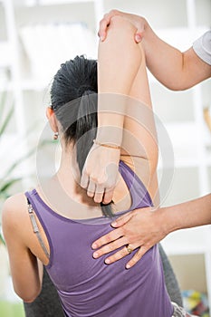 Chiropractor massage the patient spine and back