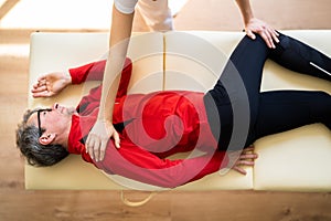 Chiropractor Therapist Doing Physio Shiatsu Massage