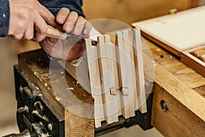 Chisel working and sawdust on wooden press. Woodworking lifestyle, organic eco friendly design elements.