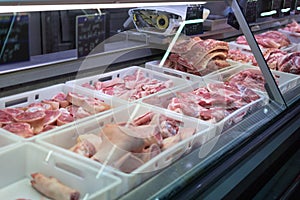 Chisinau, Moldova - January 23, 2022: Refrigerated display case with fresh meat in supermarket. Fresh meat in Metro Cash Carry