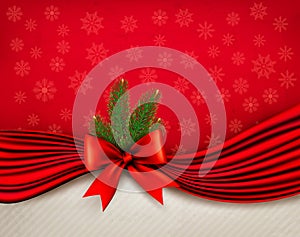 Chistmas holiday background with gift glossy bow and ribbons.