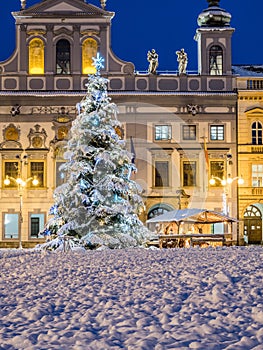 Chistmas tree at the square with the historical town hall in the evening in Ceske Budejovice