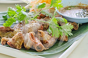 Chitterlings Fried garlic on white back ground, photo