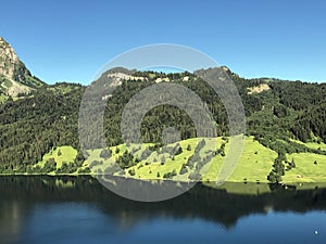 Chli Mutzenstein mountain above the Wagital valley Waegital or WÃ¤gital and alpine Lake Wagitalersee WÃ¤gitalersee, Innerthal