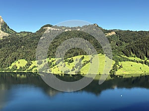 Chli Mutzenstein mountain above the Wagital valley Waegital or WÃ¤gital and alpine Lake Wagitalersee WÃ¤gitalersee, Innerthal