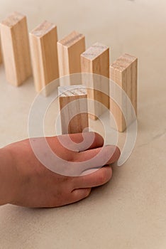 Chlid playing with Wood blocks