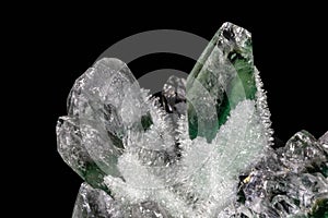 Chlorinated Quartz Crystals. Large crystals green and white; surrounded by clusters of smaller crystals.