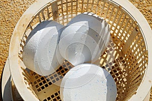 Chlorine tablets in plastic basket. photo