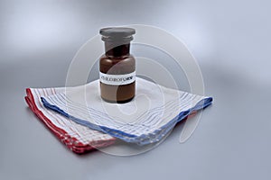 Chloroform in a brown laboratory vial stock images