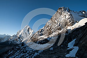 Cho La pass peaks at dawn in Himalaya mountains