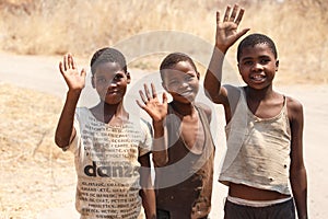 CHOBE, BOTSWANA - OCTOBER 5 2013: Poor African children wander t