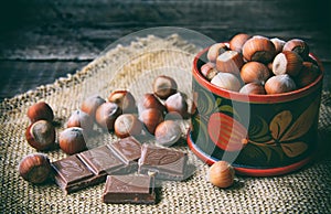 Chocolade and hazel nuts in wooden box