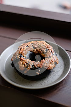 Chocolate bagel on a plate