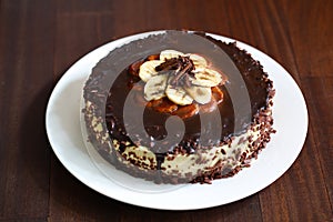 Chocolate and banana cheesecake with ganache