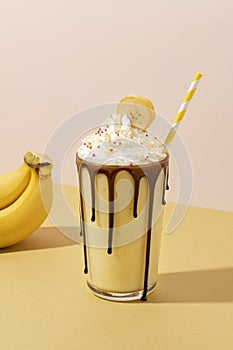 Chocolate banana milkshake with whipped cream