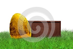 Chocolate bar and golden Easter egg