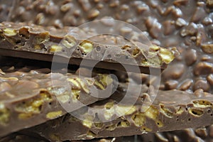Chocolate bars with nuts bstract background