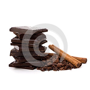 Chocolate bars stack and cinnamon sticks