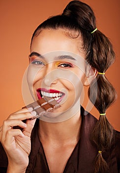 Chocolate, beauty and portrait girl eating sugar candy, sweets or dark chocolate dessert for stress relief. Skincare