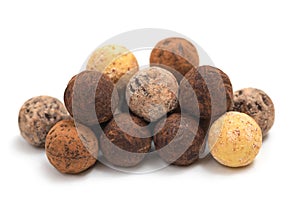 Chocolate Belgian truffles on a white background. Pastry close-up