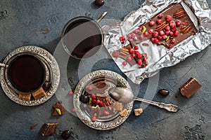 Chocolate with berries and pistachios, top view