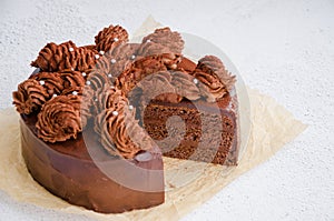 Chocolate Birthday cake. Homemade delicious chocolate cake on a light background. Sweet food. Sweet dessert. Close up.