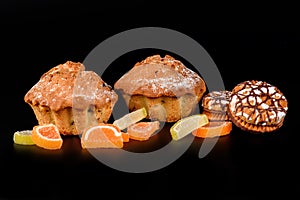 Chocolate biscuit cake, cookies and fruit candy