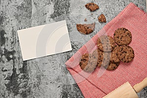 Chocolate biscuit cookies white napkin on stone table
