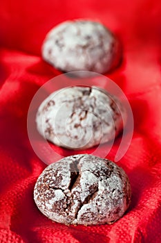 Chocolate biscuits covered with icing sugar