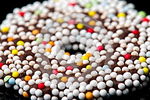 Chocolate biscuits rings on black background
