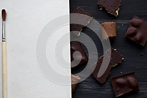 Chocolate on black the old table