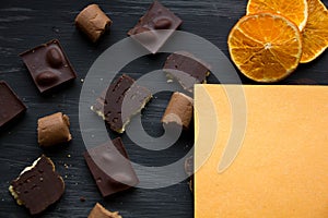 Chocolate on black the old table