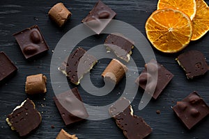 Chocolate on black the old table