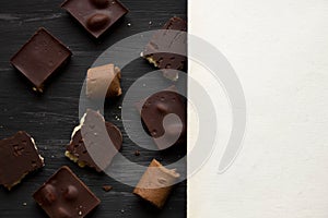 Chocolate on black the old table