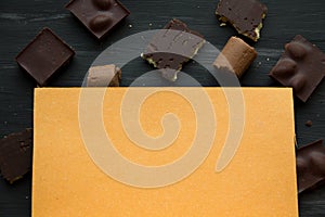 Chocolate on black the old table