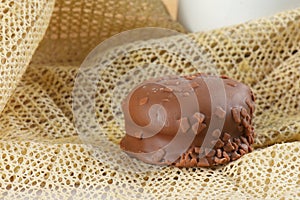 chocolate bonbon with dulce de leche delicious caramel sugar filling isolated caloric